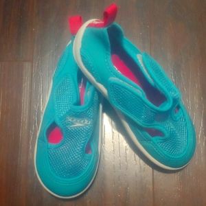 Blue Speedo water shoes